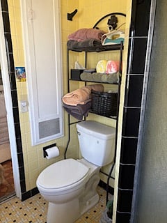 Secondary bathroom has shower and laundry facilities.