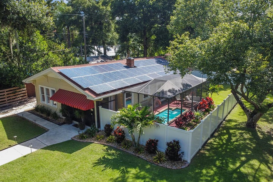The home is situated on a generously sized corner lot just one house away from Lake Roberta