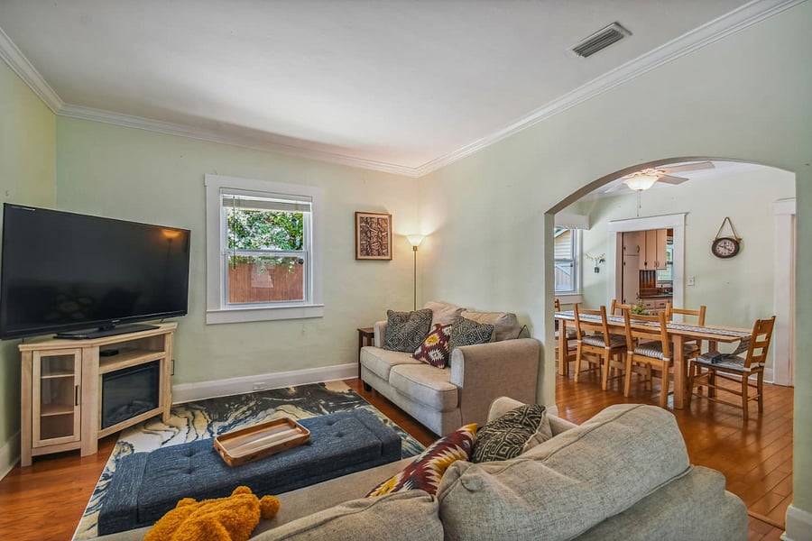 Cozy living room with Roku-enabled 60 TV
