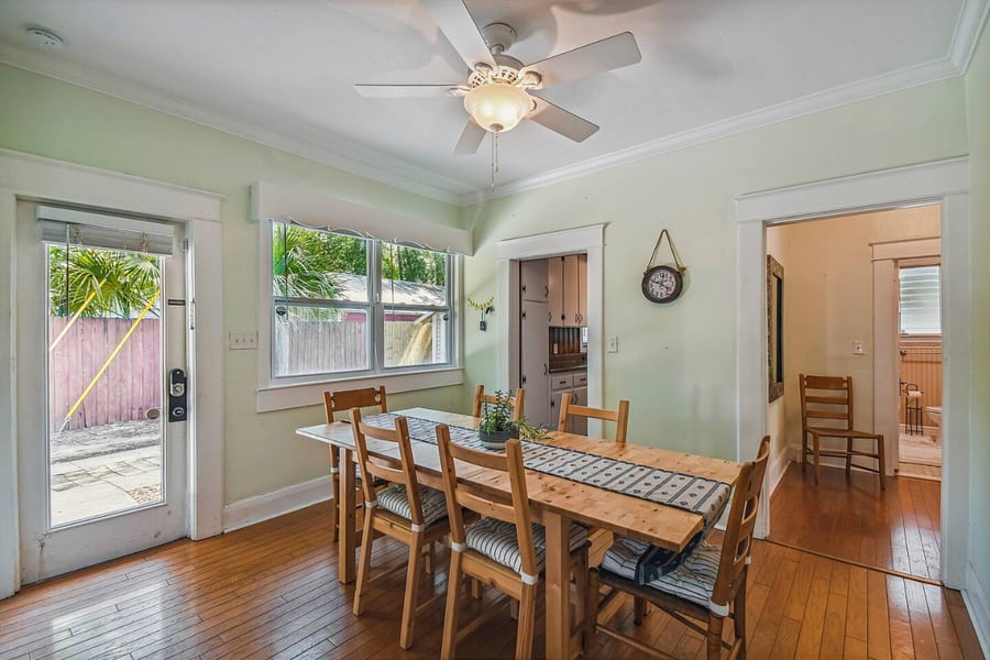Dining room table has extra leaves and can seat up to 8 comfortably.