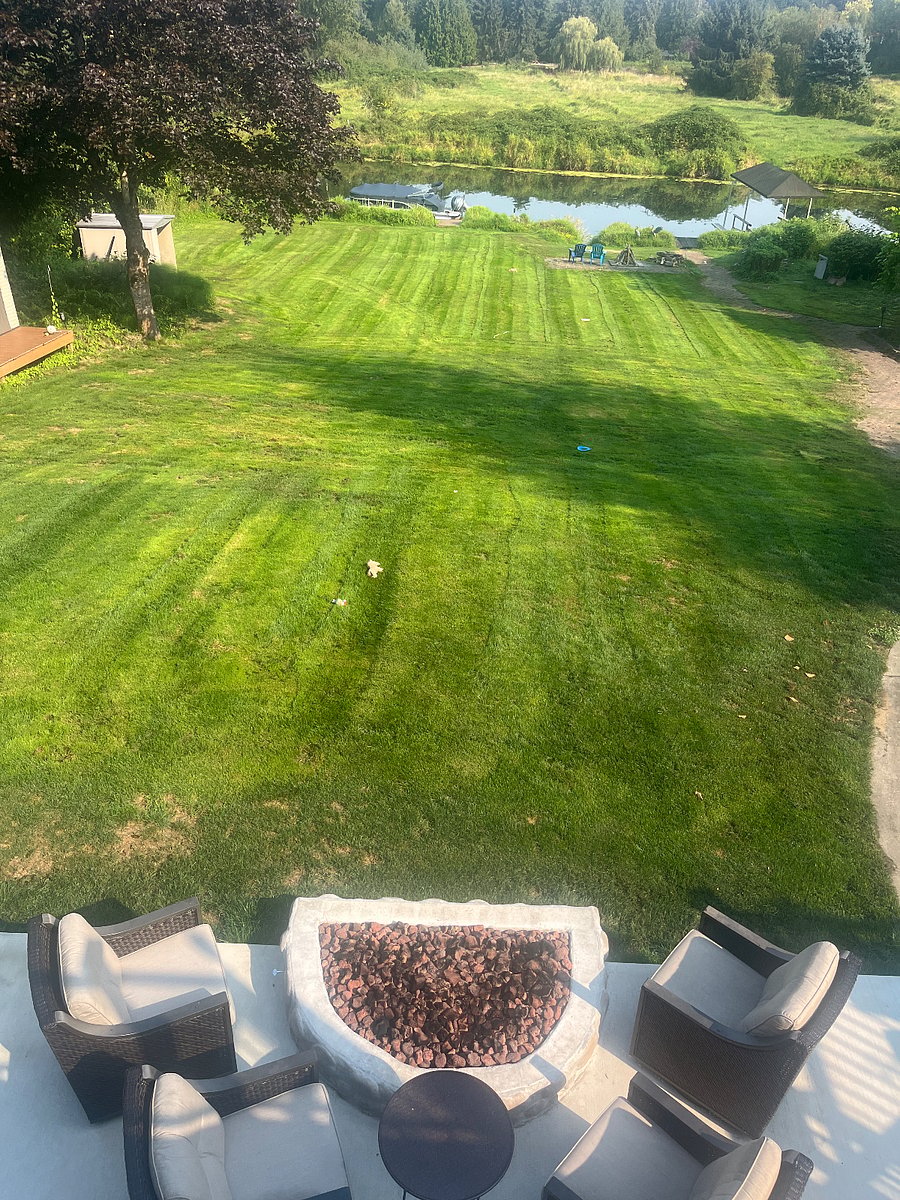 Bottom patio built in firepit.