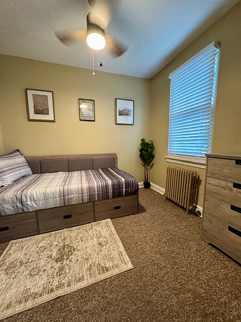 Second bedroom features a daybed w/ an XL-Twin memory foam mattress and plenty of storage space, as well as a four-drawer chest. 
