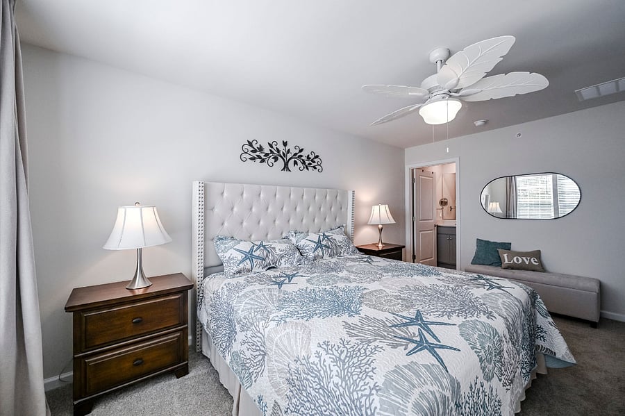 King Size Bed Facing 65" TVQ