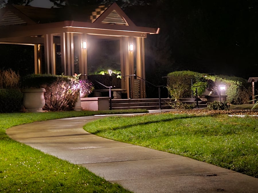 View from one of the walking areas in the neighborhood, close to the home. At night walking around. Wrll lit & safe neighborhood.