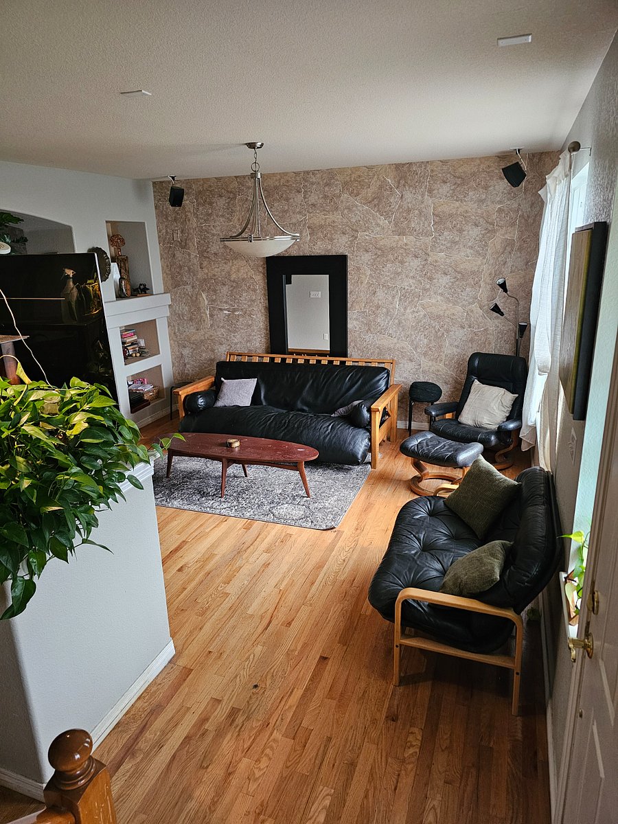 Living room. View from bottom of stairs