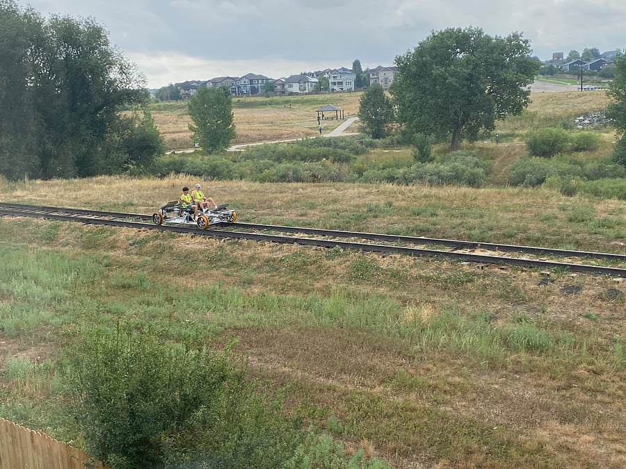 The train tracks behind the home are decommissioned and only used for rail bikes!