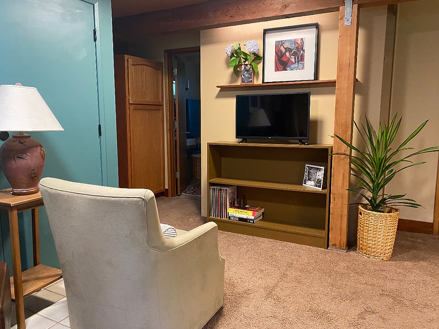 Chairs swivel to watch TV or enjoy the fire.