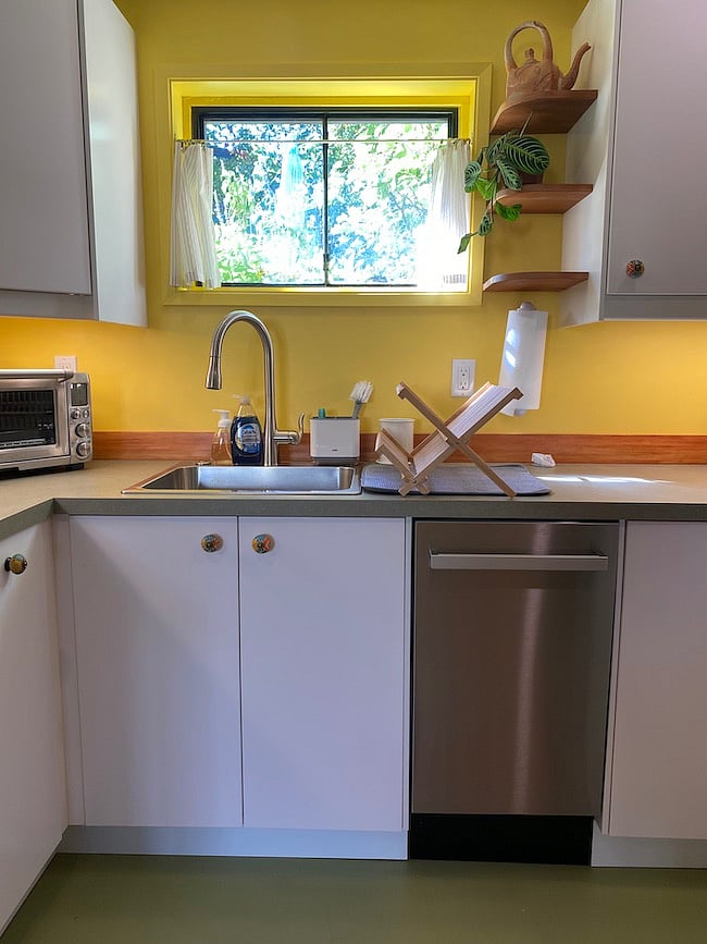 Operable window with a garden view! Quiet Bosc dishwasher. In sink garbage disposal.