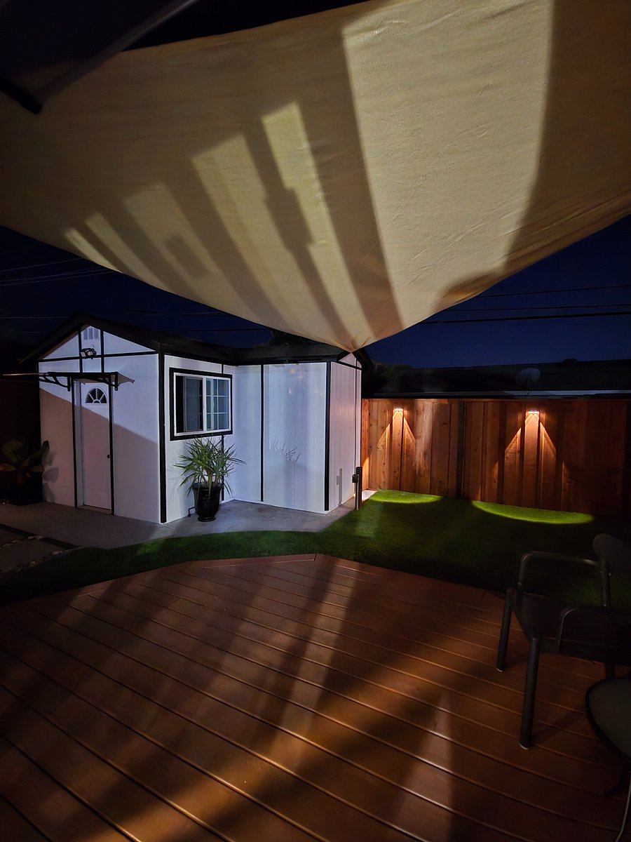 Night view of private back yard space.