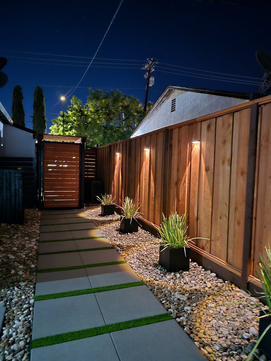 Private entrance leading to fully fenced yard.