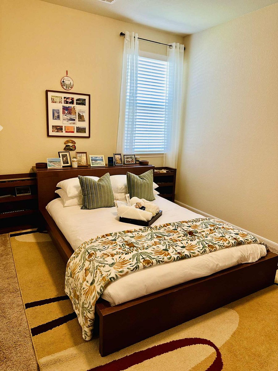 The Postcard Room | Fully equipped with comfortable bed, Smart TV, walk-in closet, hangers, luggage rack, and desk/workspace.