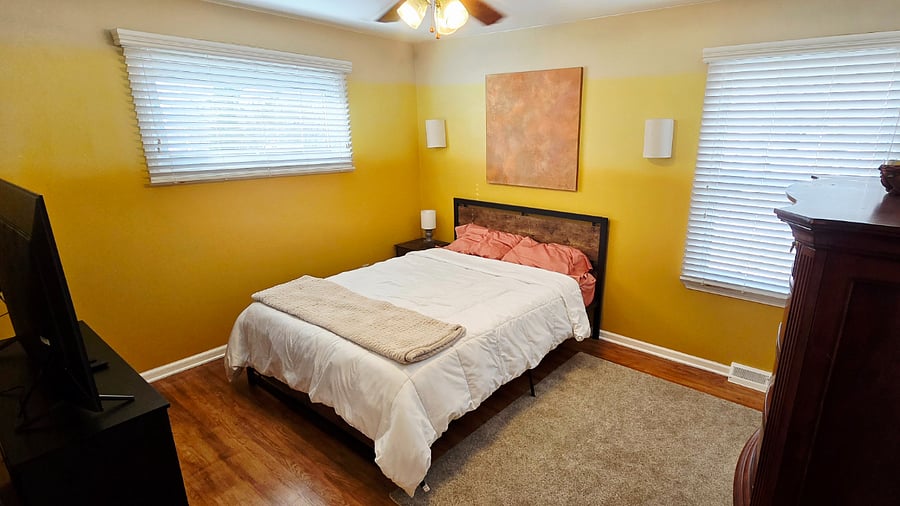 Master bedroom with queen-size bed.