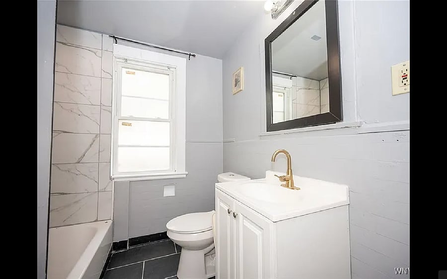 Full Bath - Downstairs Unit