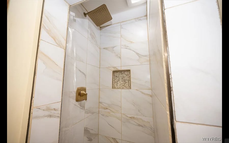 Front Bathroom with Rain Shower - Downstairs Unit