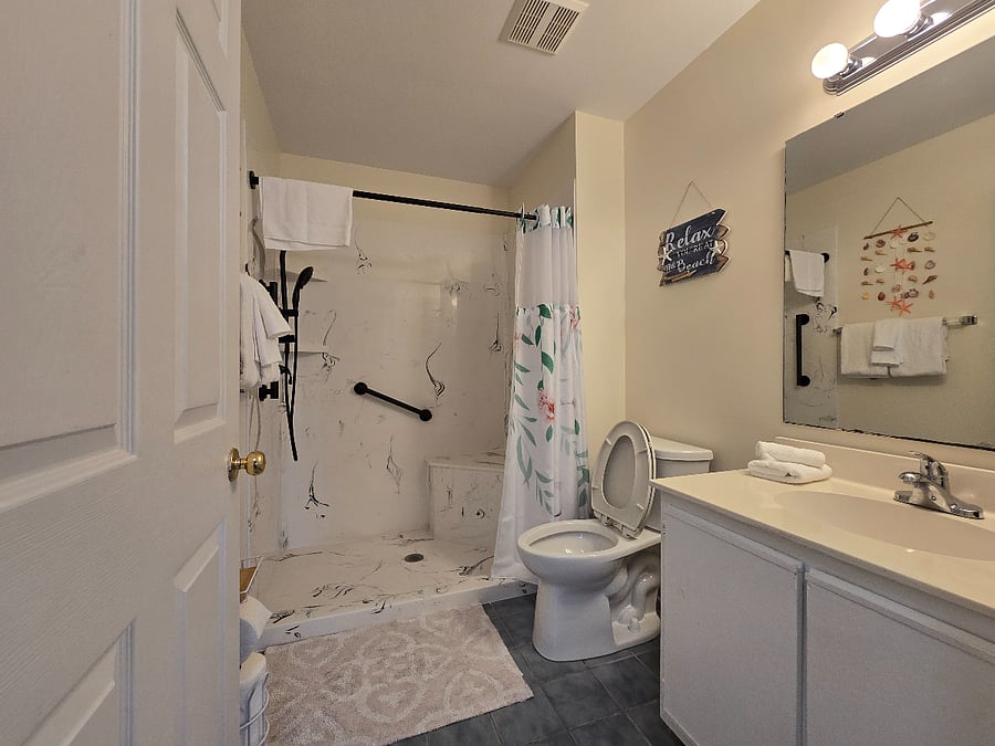 hall bath with updated walk-in shower