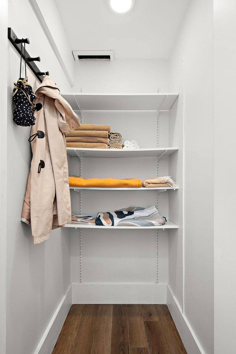 Hall closet for extra linens, jackets and general storage