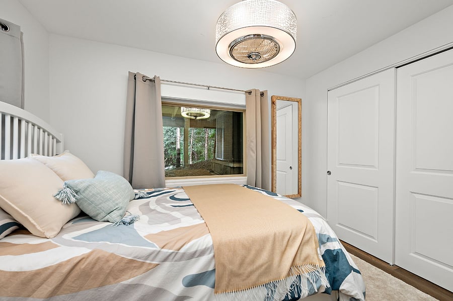 The bedroom closet is extra deep and has customizable shelving and drawers.