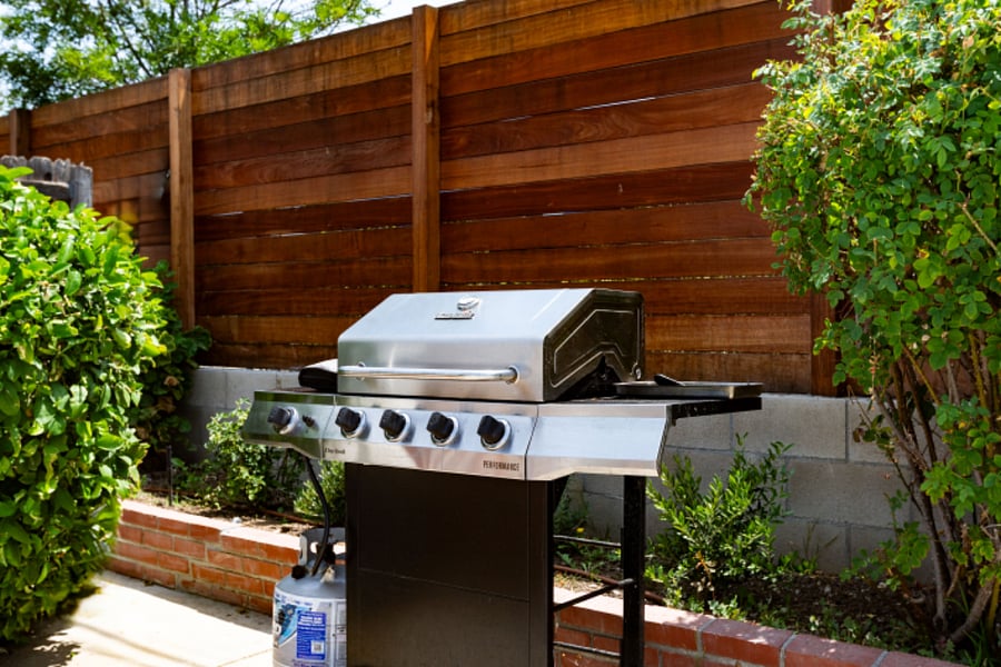 Outdoor BBQ grill in private backyard, easy monthly meal prep