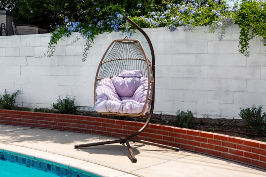 Poolside hanging chair for relaxing during mid-term stays