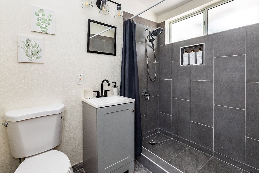Modern bathroom with walk-in shower and updated finishes