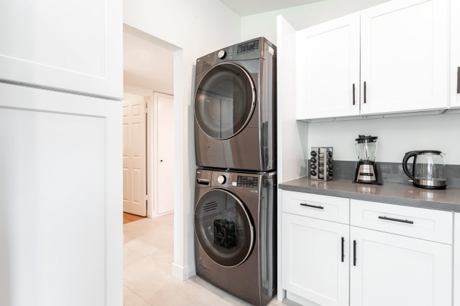 In-unit laundry with stacked washer/dryer, convenient long-term setup