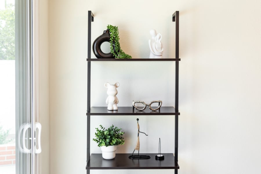 Decor shelving adding a homelike feel for extended monthly stays