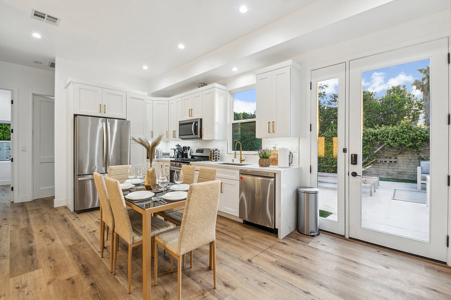 Dining area seating six with indoor-outdoor access