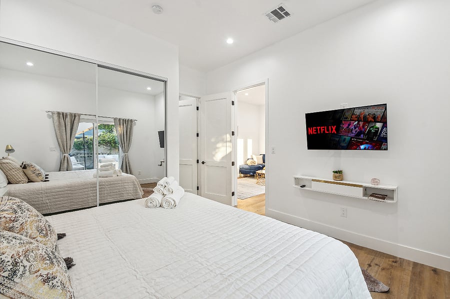 Comfortable bedroom with smart TV and high-speed WiFi