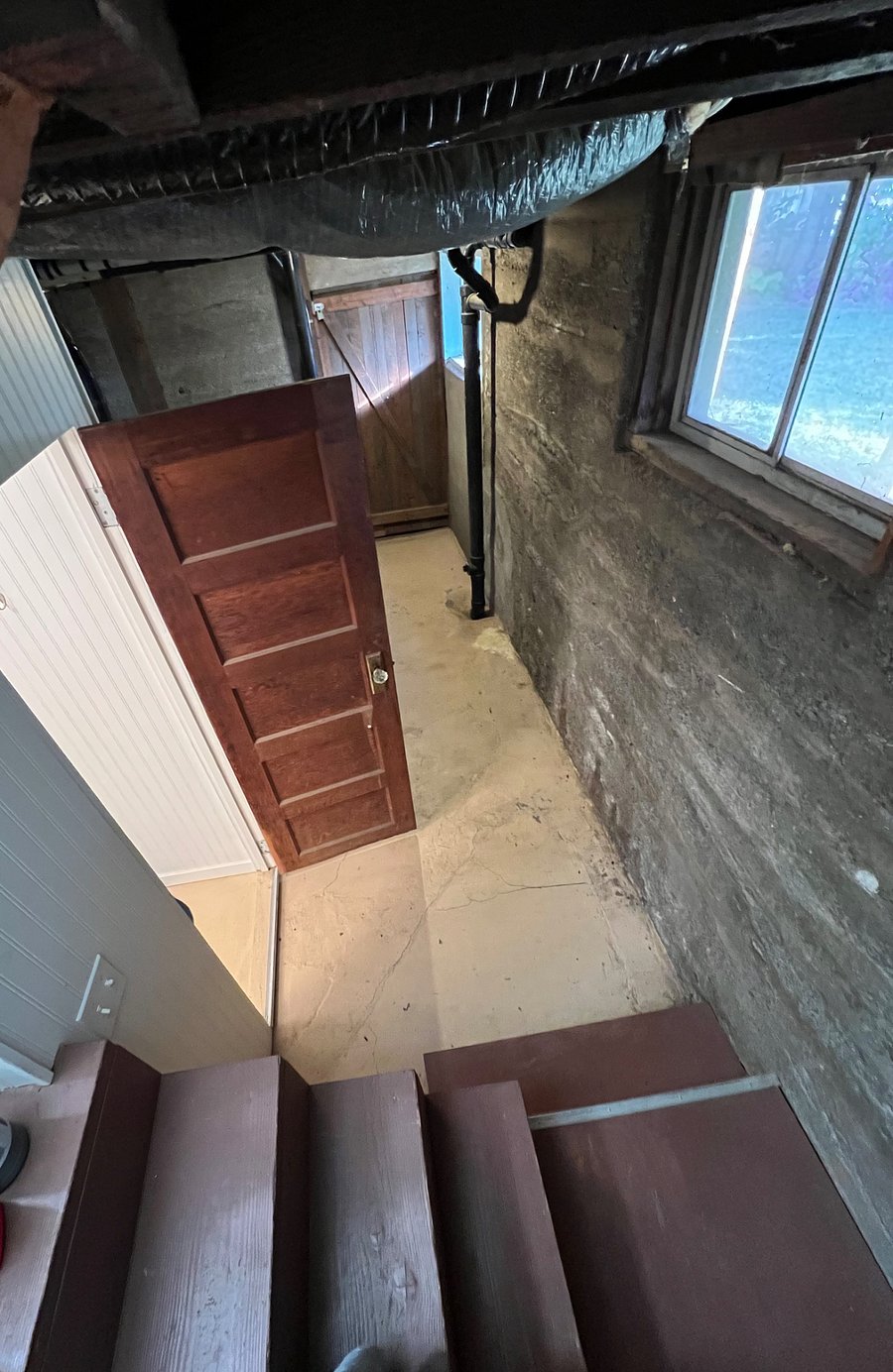 Basement stairs to downstairs bathroom