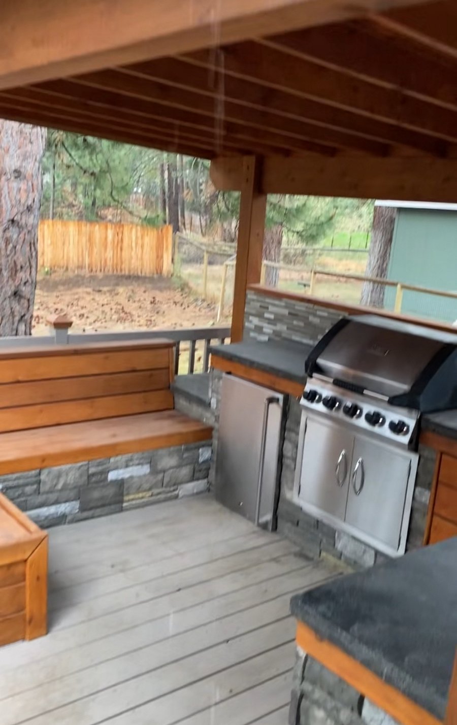 Back patio kitchenette with sink and fridge
