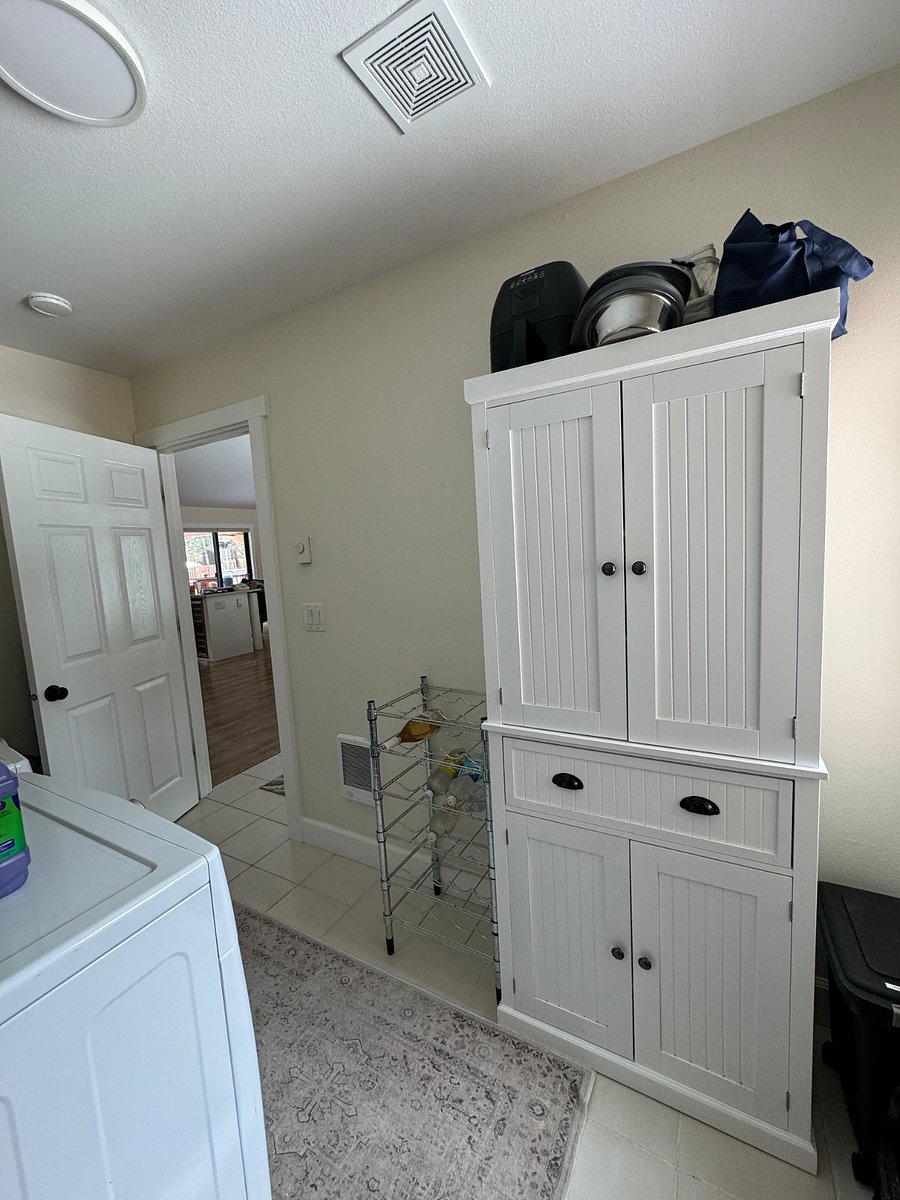 Laundry room with pantry