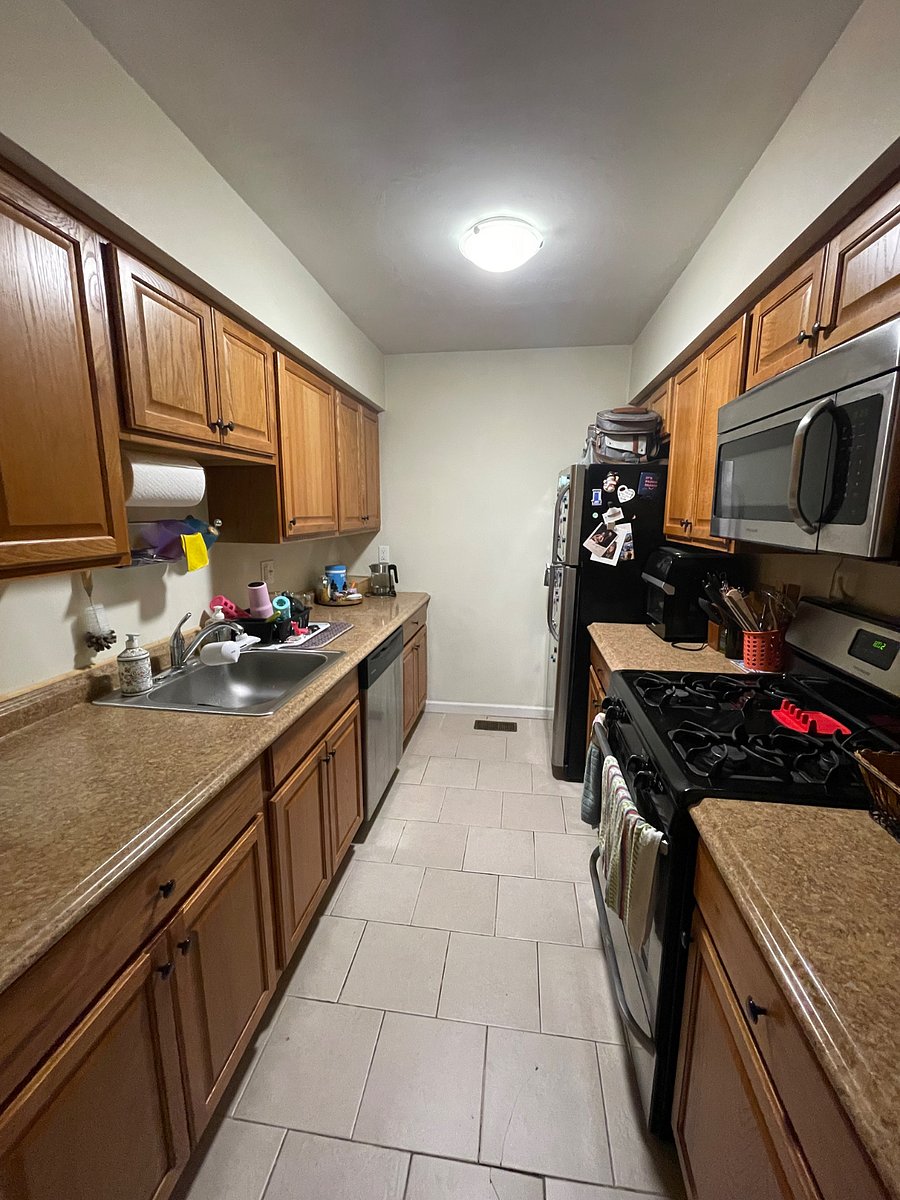 Kitchen, has a dishwasher, standard fridge, gas stove and oven, air fryer, drip coffee maker, filtered water attached to the tap