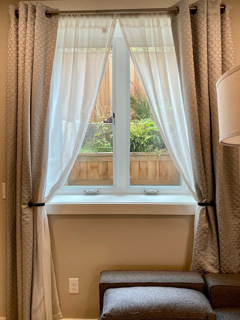Large windows with light blocking curtains