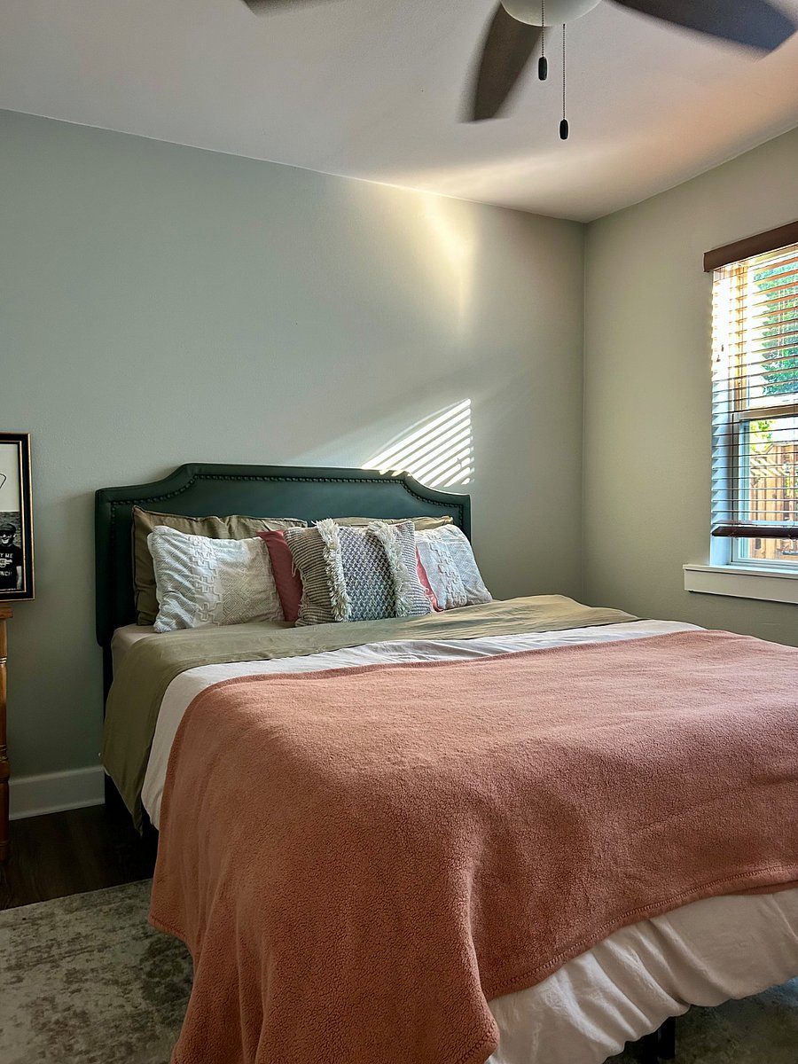Queen sized bed with beautiful natural light