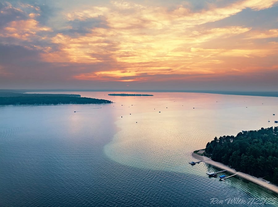 Beautiful Higgins Lake is less than 1 mile from the home