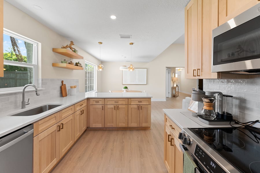 Bright, spacious kitchenfully stocked for comfort, recovery, and ease.