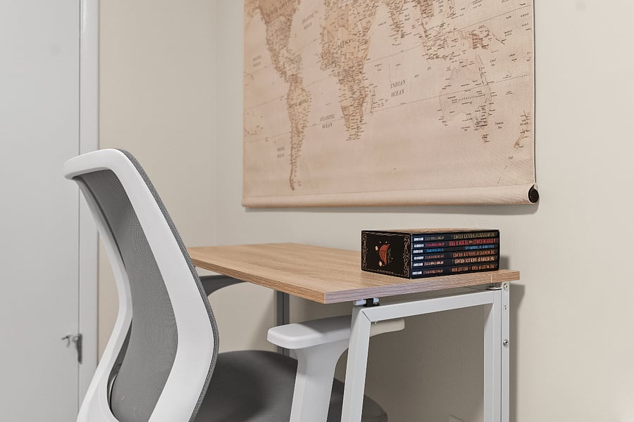 Compact, comfortable desk setup perfect for reading, writing, or catching up on emails. Whether you're working remotely or journaling in peace, this quiet nook is designed to support calm focus while feeling grounded and uncluttered.