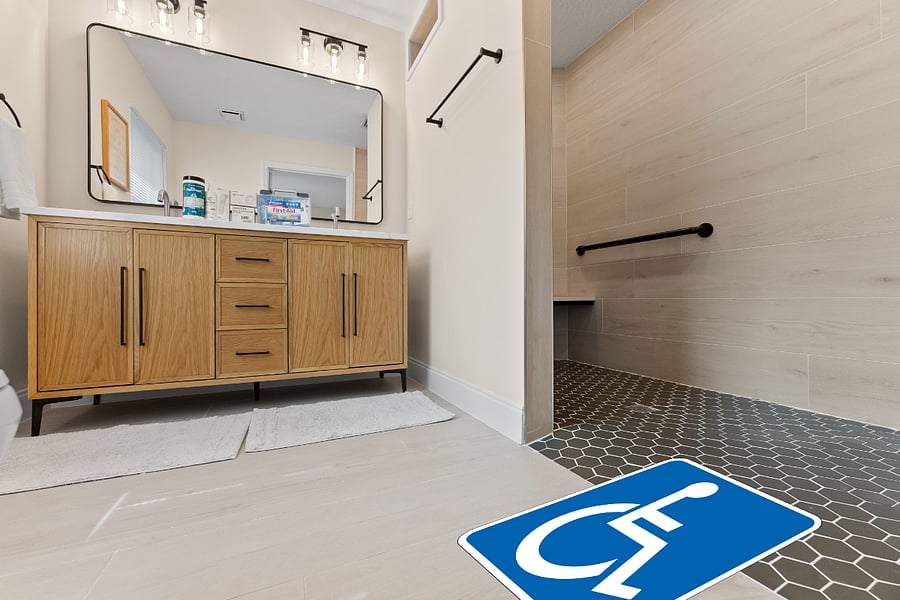 A closer look at the master bathrooms accessible design: zero-threshold shower entry, supportive grab bars, and ample space for mobility aids. Every detail was thoughtfully planned to provide comfort, safety, and dignity for our guests.