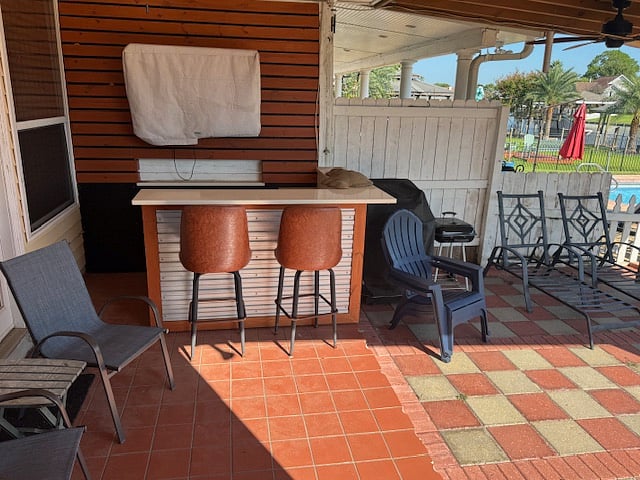Outside Covered Patio with Bar, TV, Gas grill, fire pit and Ceiling Fans