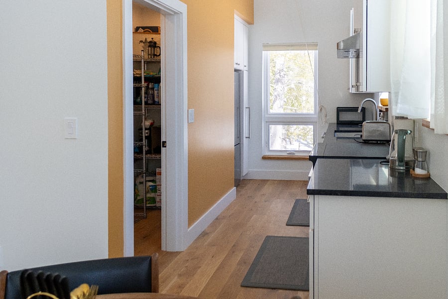 Kitchen pantry with shelves for you to use, plus cleaning supplies provided.