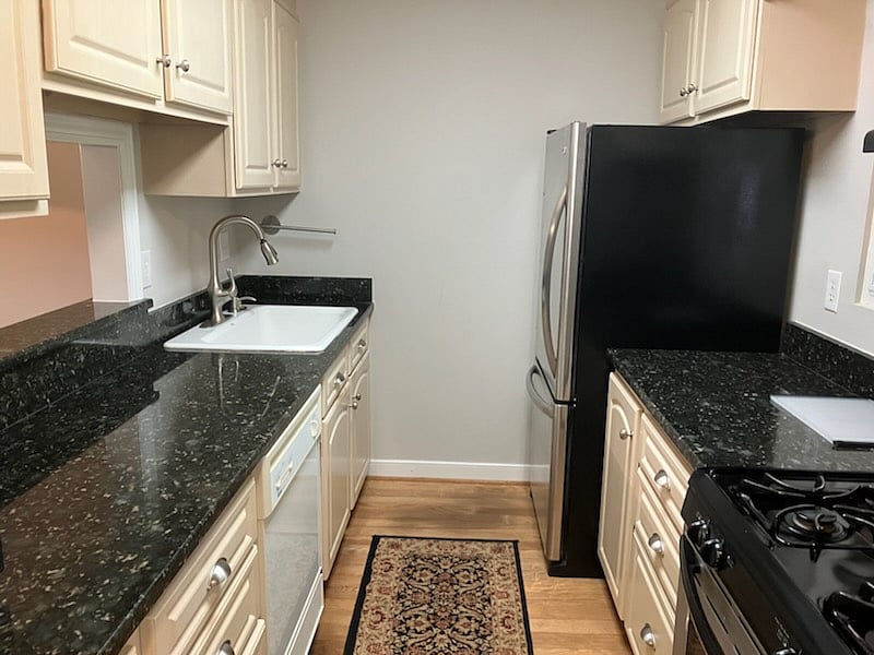 Kitchen with gas stove/oven and pass through to dining room