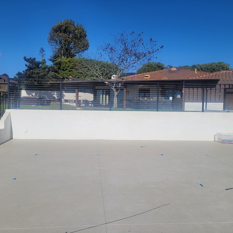 View from empty lot next door, with future pickle ball and half-basketball court. 