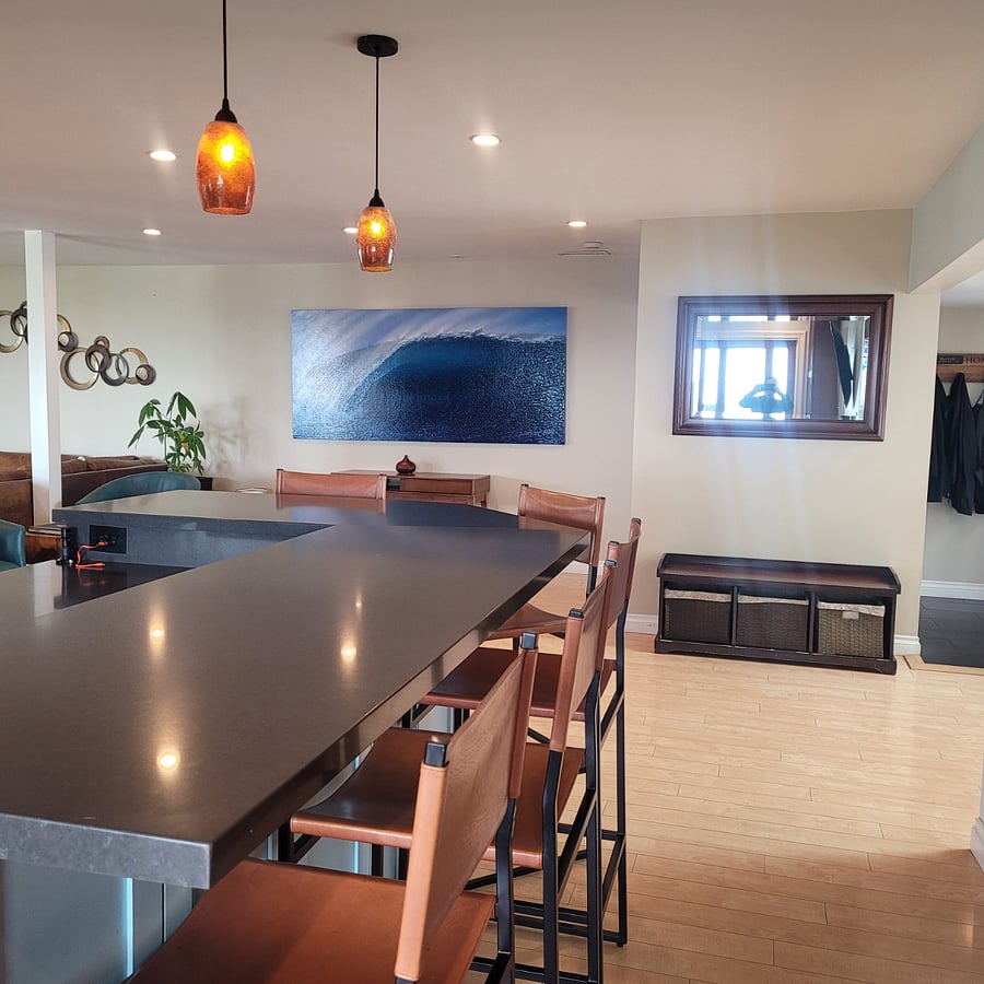 Counter-top bar/sitting area with seating for five. 