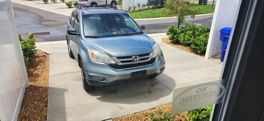 Parking pad for two vehicles