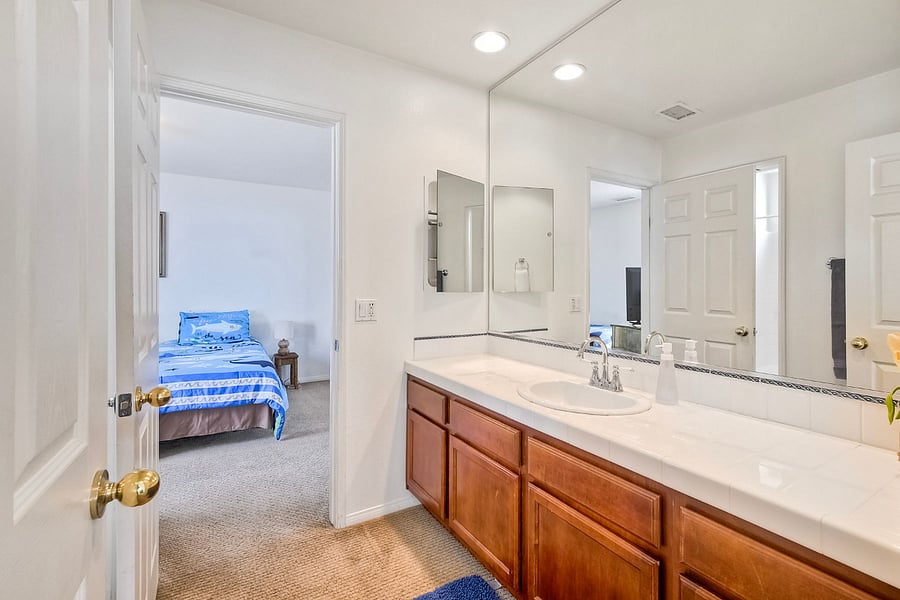 Spacious counter and easy dressing area in main bathH