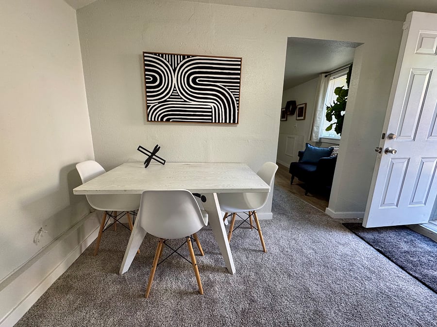Table that can be used as a dining area and/or laptop desk area.