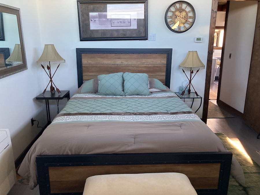 Bedroom with deck access and sunrise views 