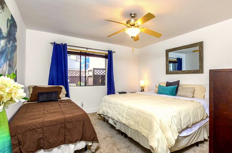 Luxurious Master Bedroom with King Bed and Twin Bed for guests