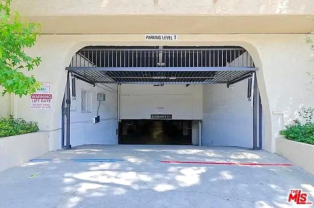 Gated garage with one assigned parking space included