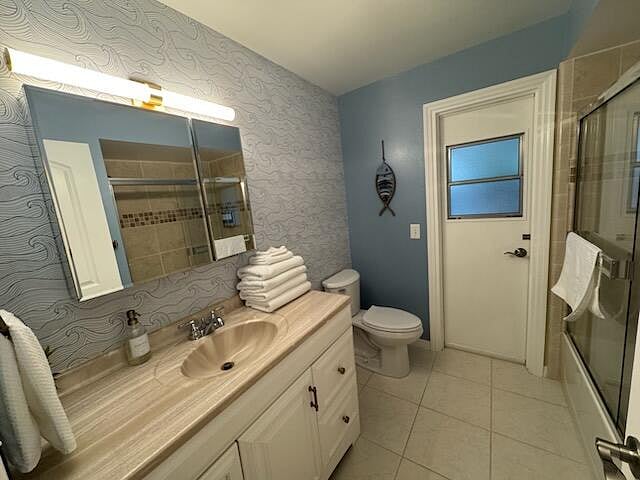 Bathroom 2 with exterior door to pool area 
